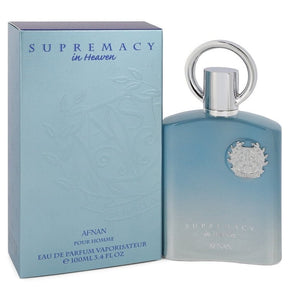 A blue gradient perfume bottle featuring a circular silver cap stands beside its matching box. Both the box and bottle are labeled "Supremacy in Heaven EDP Perfume for Men 3.4 oz/100 ml" by Afnan, an Eau de Parfum Vaporizateur that exquisitely captures tranquility with its refined fragrance notes.