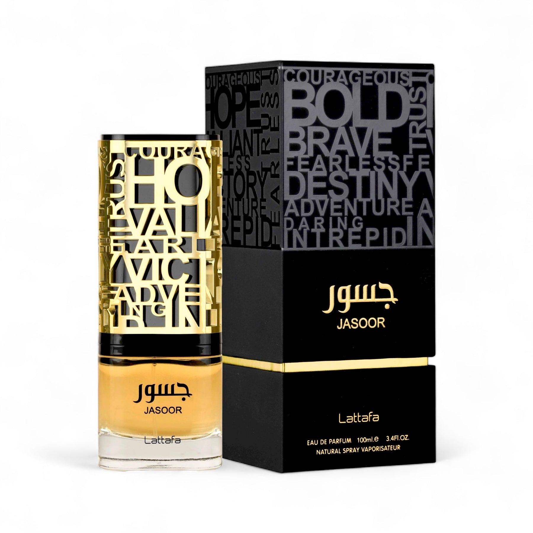 A bottle of Lattafa's Jasoor EDP Perfume 3.4 oz/100 ml is placed next to its sleek black box. The bottle boasts bold golden lettering and contains a yellow liquid. The box is adorned with motivational words like "Courageous" and "Fearless" in various fonts, hinting at the sophisticated scent of this men's fragrance.