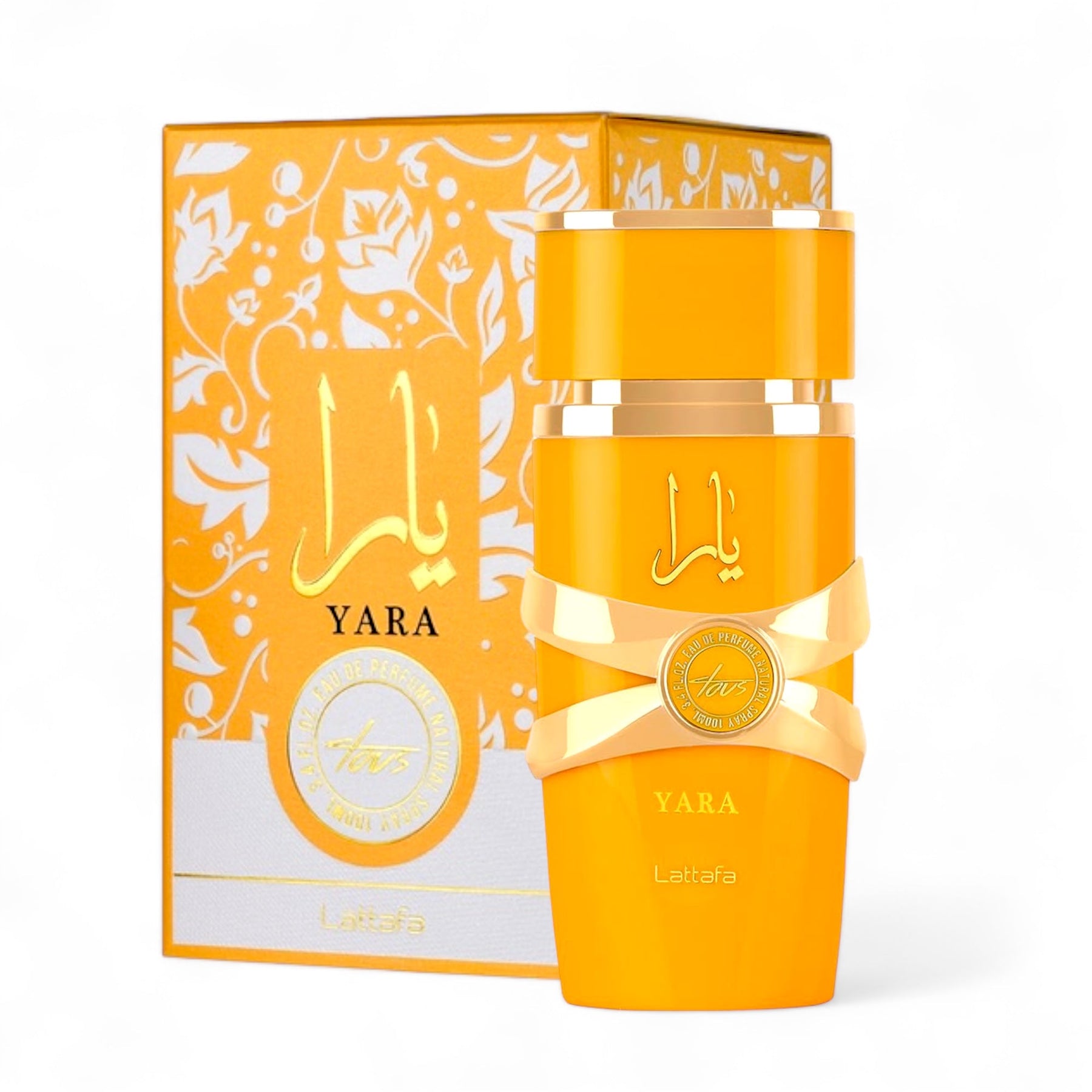 The Yara Tous EDP Perfume for Women by Lattafa comes in a yellow bottle adorned with gold accents, exuding tropical elegance. The bottle is labeled "Yara" and is paired with a matching box that features floral patterns and Arabic script, further emphasizing the luxurious fragrance experience from Lattafa.